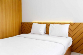 Fancy and Elegant Studio at Patraland Urbano Apartment By Travelio